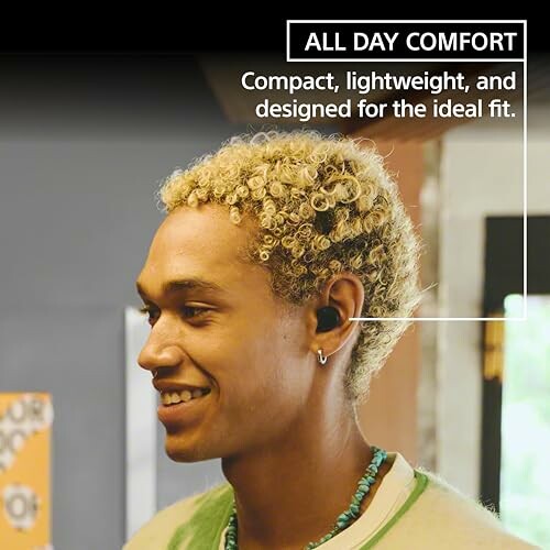 Person wearing compact, lightweight earbuds for ideal fit.