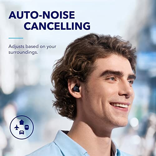 Man wearing earbuds with auto-noise cancelling feature.