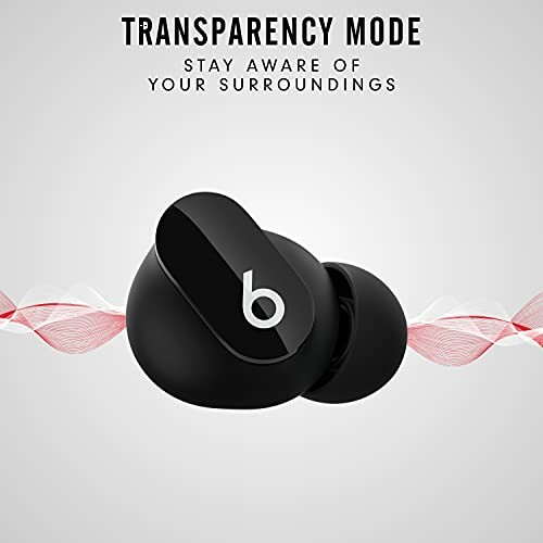 Black wireless earbuds with transparency mode feature.