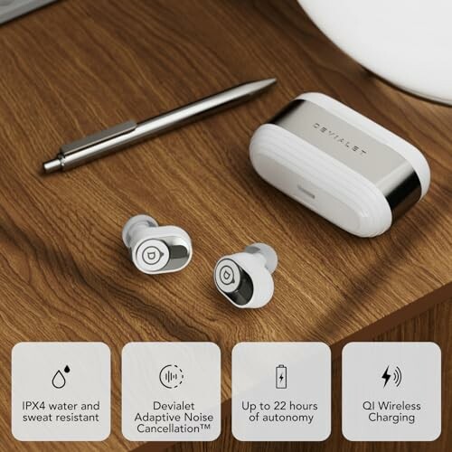 Devialet earbuds with charging case on wooden surface, featuring noise cancellation, water resistance, and wireless charging