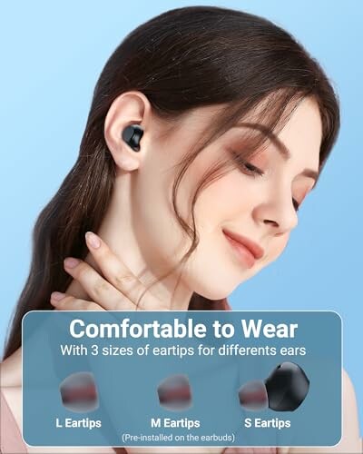 Woman wearing earbuds with eartip size options displayed.