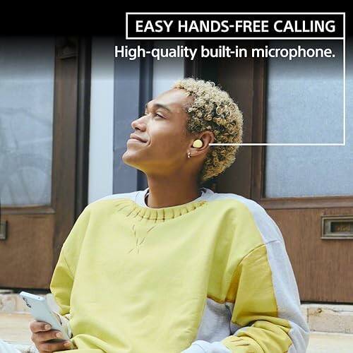 Person using wireless earbuds with text: Easy hands-free calling, high-quality built-in microphone.