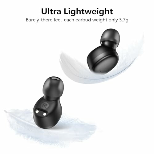 Black earbuds floating above feathers, highlighting lightweight design.