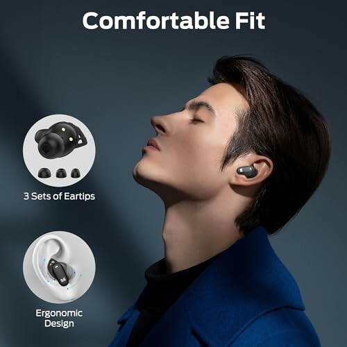 Man wearing wireless earbuds with eartips and ergonomic design.